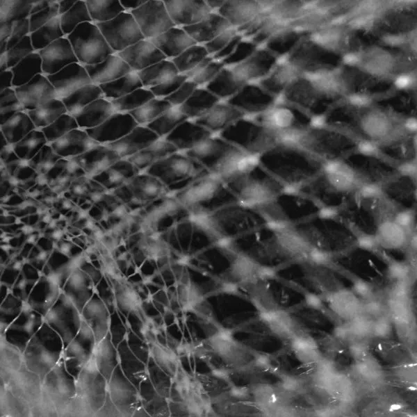 Een close-up van wit geweven draadgaas